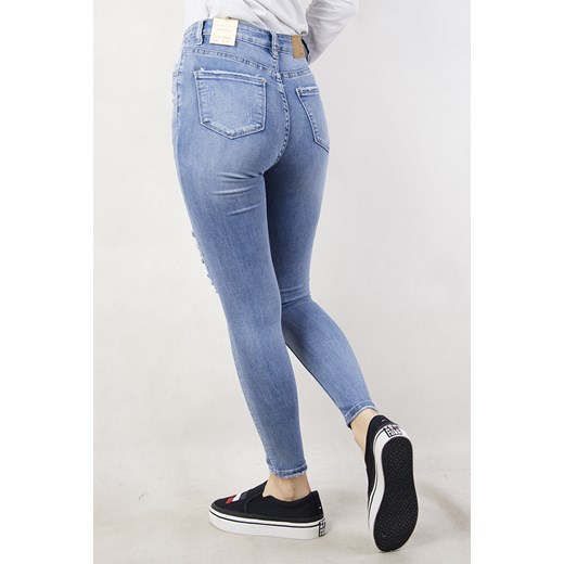 Jasne spodnie jeansowe z przetarciami   XL olika.com.pl