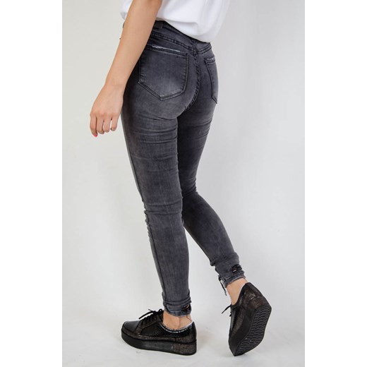 Szare spodnie jeansowe z szarpaniem na nogawce   XS olika.com.pl