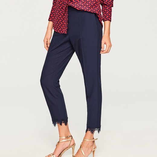 Reserved - Spodnie z ozdobnym wykończeniem - Granatowy Reserved  42 