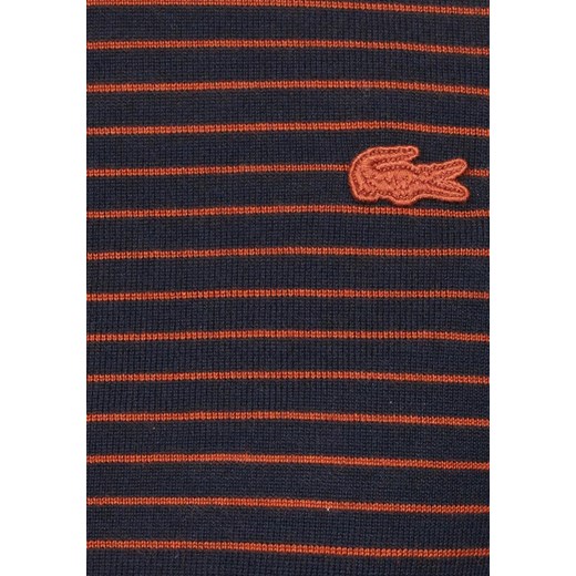 Sweter damski Lacoste brązowy w paski