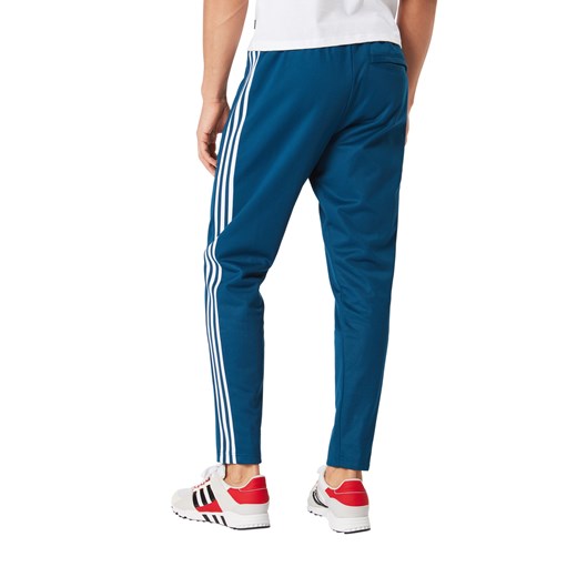 Niebieskie spodnie sportowe Adidas Originals bez wzorów 