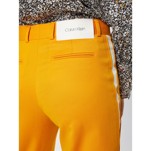 Żółte spodnie damskie Calvin Klein 