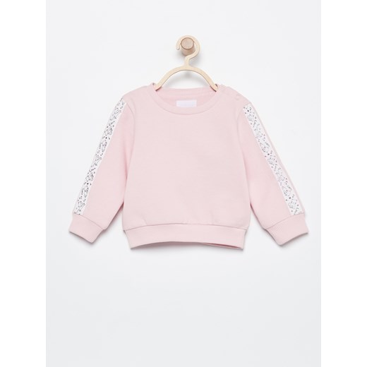 Reserved odzież dla niemowląt na zimę w abstrakcyjnym wzorze bawełniana różowa 