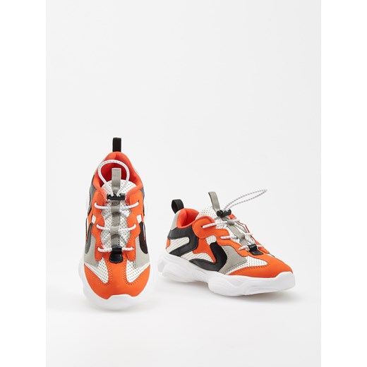 Buty sportowe dziecięce pomarańczowe Reserved bez wzorów wiązane 
