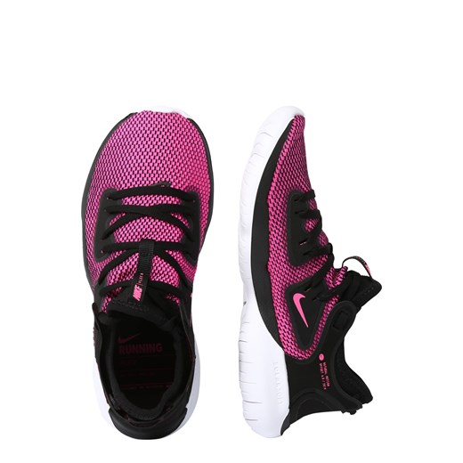 Buty sportowe damskie Nike do biegania różowe bez wzorów z gumy płaskie 
