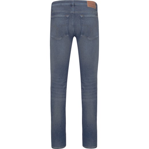 Niebieskie jeansy męskie Calvin Klein 