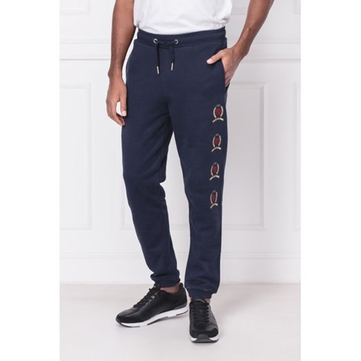 Spodnie męskie Tommy Jeans sportowe dresowe w nadruki 