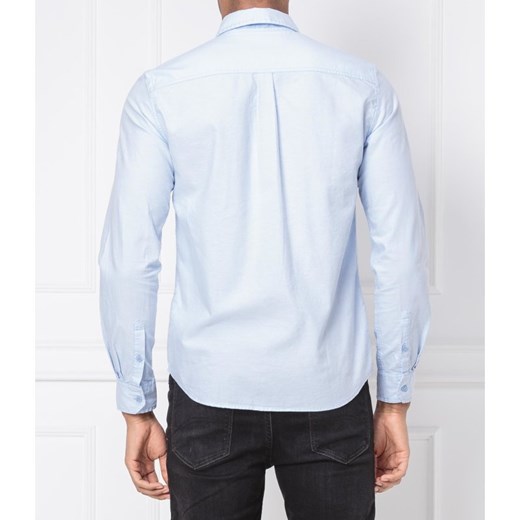 Koszula męska Calvin Klein z długim rękawem niebieska casual bez wzorów z kołnierzykiem button down 