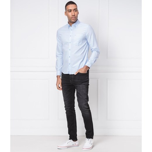 Niebieska koszula męska Calvin Klein z kołnierzykiem button down casual bez wzorów 