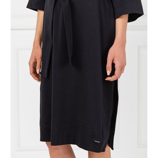 Sukienka Calvin Klein bez wzorów midi czarna klasyczna z długimi rękawami 