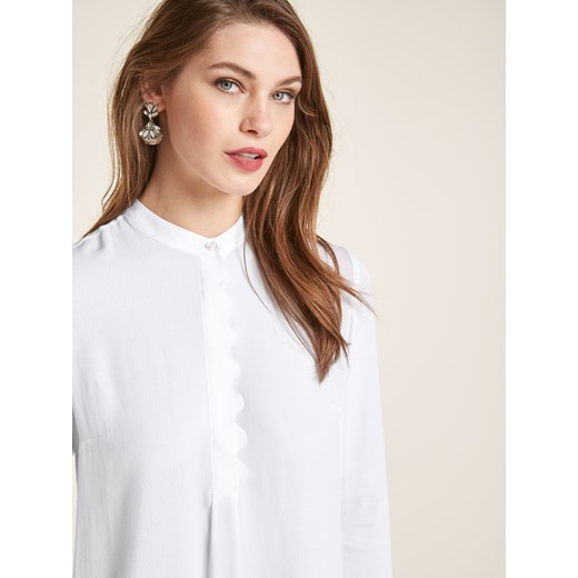 Biała bluzka damska Heine z długim rękawem elegancka bez wzorów 