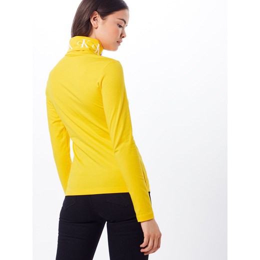 Bluzka damska Calvin Klein jesienna żółta z golfem 