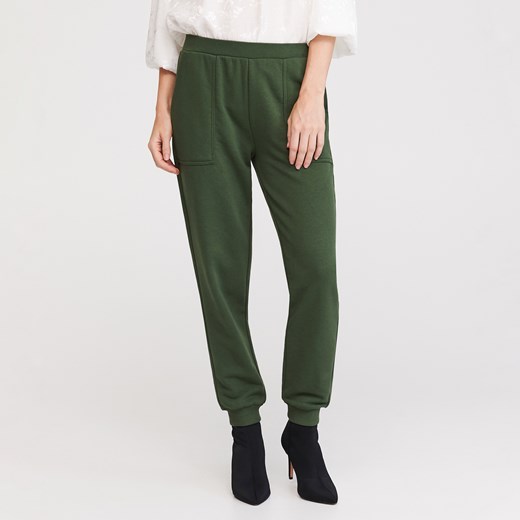 Spodnie damskie Reserved bez wzorów zielone dresowe 