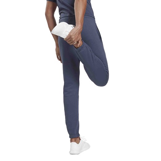 Spodnie sportowe Reebok niebieskie z poliestru 