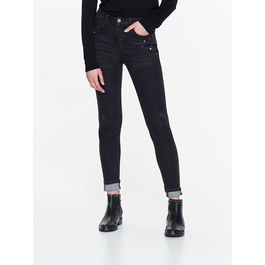 Spodnie długie damskie, obcisłe jeansy z metalową aplikacją w gwiazdki Top Secret 34 okazja Top Secret