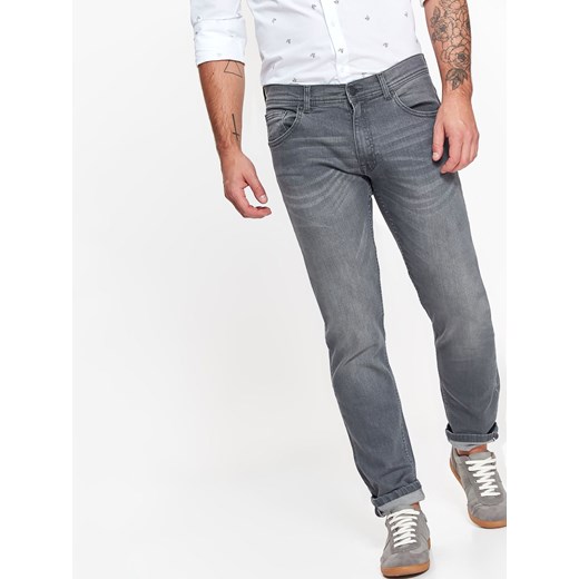 Spodnie męskie jeansowe z lekkim opraniem o kroju slim
