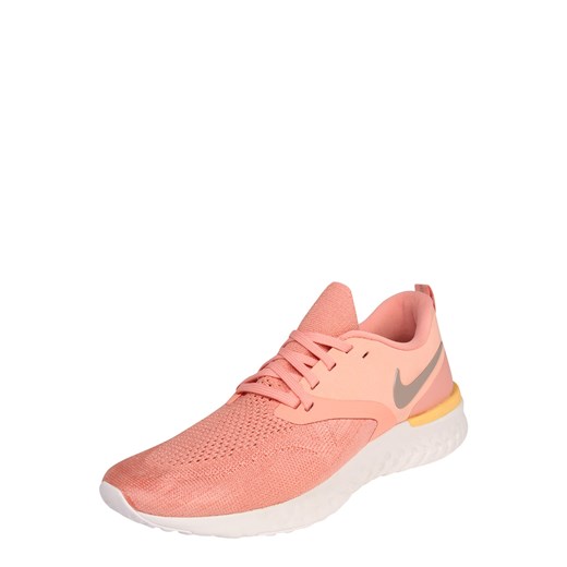 Buty sportowe damskie Nike dla biegaczy różowe płaskie sznurowane gładkie 