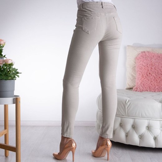 Beżowo szare rurki jeansowe - Spodnie  Royalfashion.pl 42 
