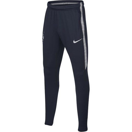 Spodnie chłopięce Nike niebieskie bez wzorów na jesień 