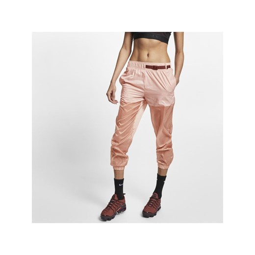 Damskie spodnie z tkaniny Nike Sportswear Tech Pack - Różowy