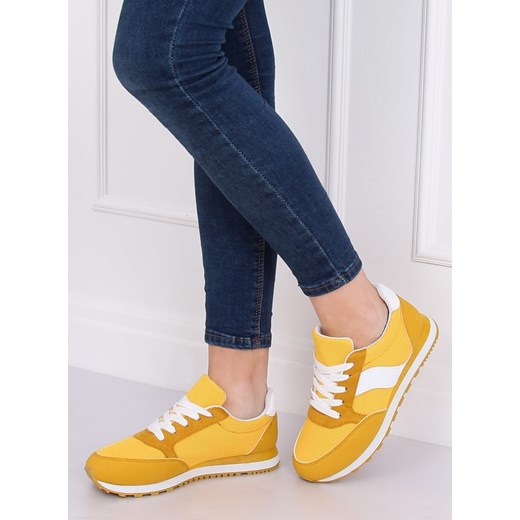 Buty sportowe damskie bez wzorów żółte ze skóry ekologicznej płaskie wiązane 