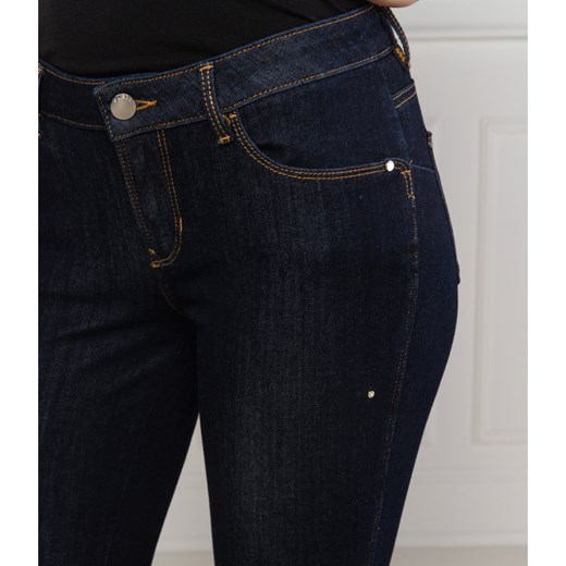 Granatowe jeansy damskie Guess Jeans 