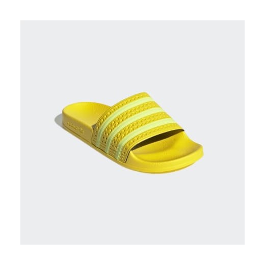 Klapki damskie żółte Adidas na płaskiej podeszwie bez wzorów 