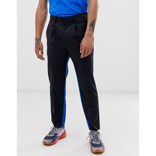 ASOS DESIGN – Granatowe zwężane spodnie garniturowe z paskami po wewnętrznej stronie nogawki-Granatowy