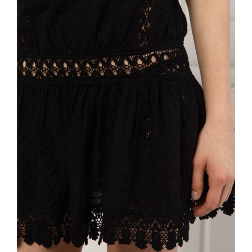 Sukienka na sylwestra czarna bez rękawów z okrągłym dekoltem rozkloszowana 