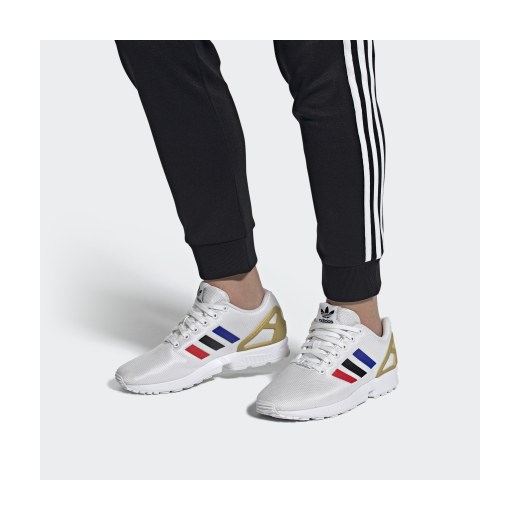 Białe buty sportowe damskie Adidas zx bez wzorów sznurowane 