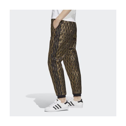 Spodnie damskie Adidas w abstrakcyjnym wzorze 