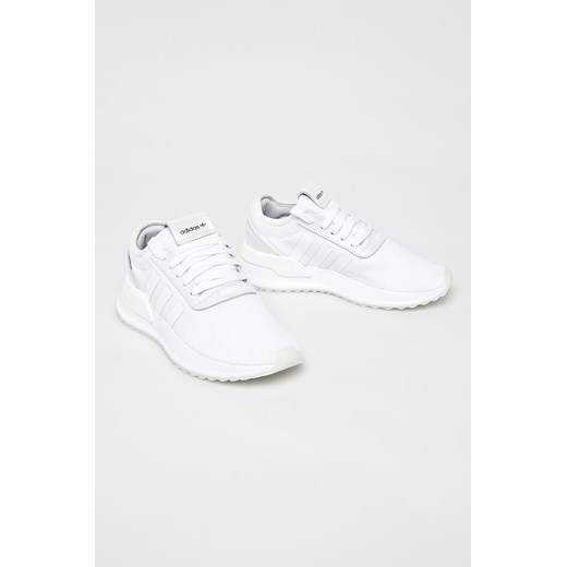 Buty sportowe damskie białe Adidas Originals skórzane płaskie bez wzorów 
