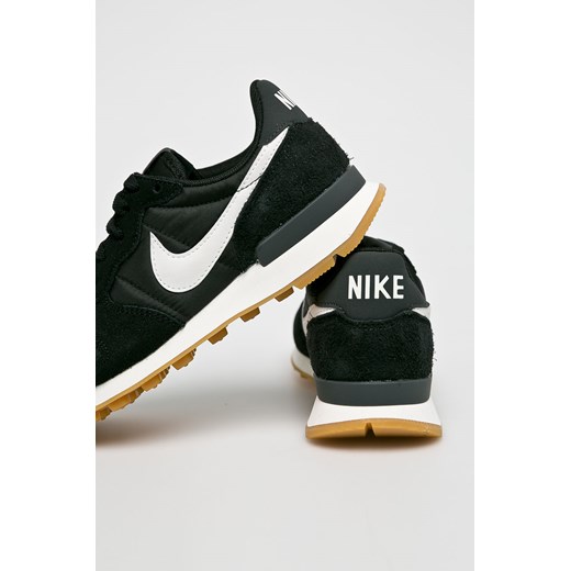 Buty sportowe damskie Nike Sportswear dla biegaczy płaskie skórzane 