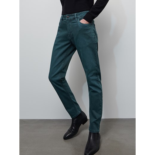 Jeansy męskie Reserved casualowe zielone bez wzorów 
