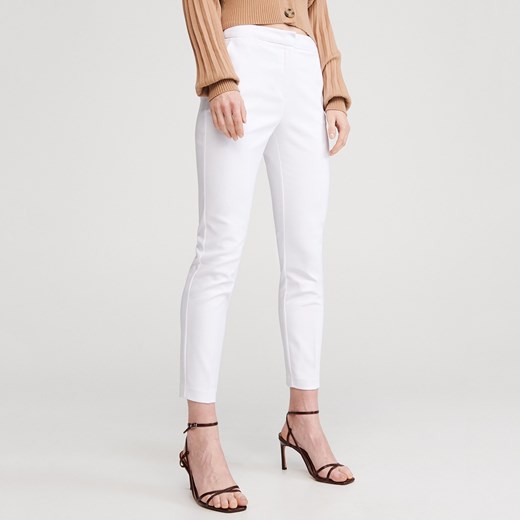 Spodnie damskie białe Reserved 