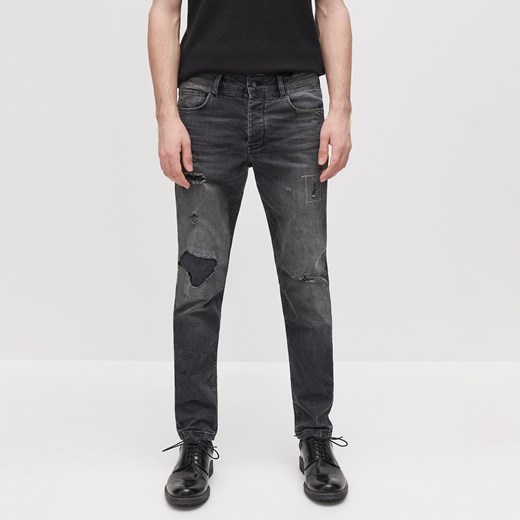 Czarne jeansy męskie Reserved 