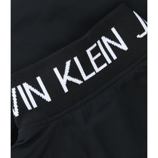 Czarna kurtka dziewczęca Calvin Klein jesienna z napisami 