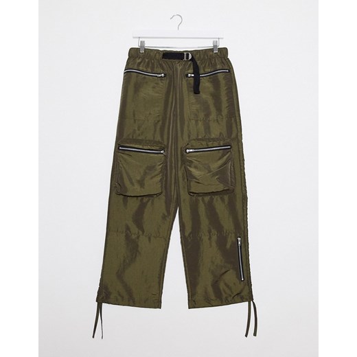 ASOS DESIGN – Spodnie z szerokimi nogawkami w kolorze khaki z parcianym paskiem-Zielony 32" Long Asos Poland