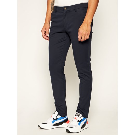 Calvin Klein Jeans Spodnie materiałowe J30J314242 Granatowy Slim Fit 33_34 wyprzedaż MODIVO