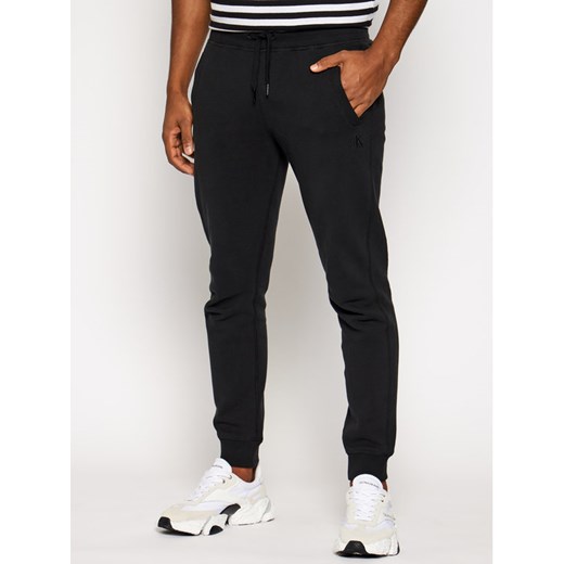 Calvin Klein Jeans Spodnie dresowe J20J215202 Czarny Relaxed Fit XS MODIVO