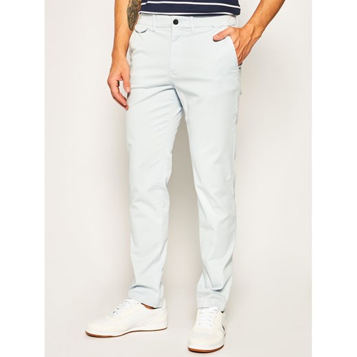 Calvin Klein Spodnie materiałowe Garmen Dye K10K104974 Niebieski Slim Fit Calvin Klein 33_34 okazja MODIVO
