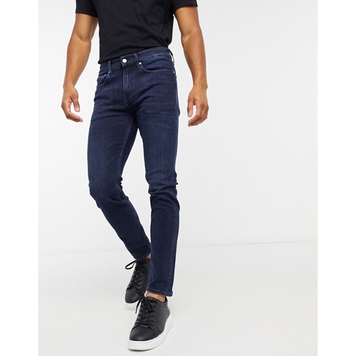 Calvin Klein Jeans – Ciemnoniebieskie jeansy o obcisłym kroju 36" Reg Asos Poland