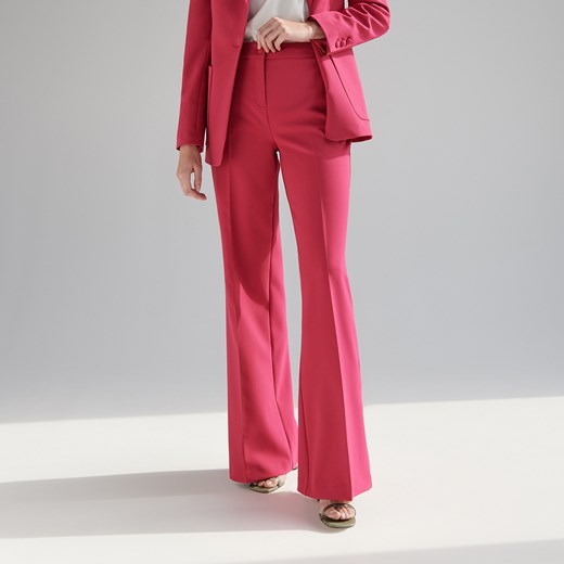 Reserved - Spodnie z rozszerzaną nogawką - Różowy Reserved 42 promocyjna cena Reserved