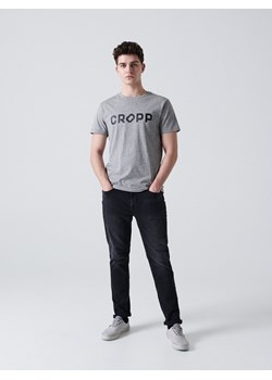 Cropp - Jeansy slim z efektem sprania - czarny ze sklepu Cropp w kategorii Jeansy męskie - zdjęcie 106045365