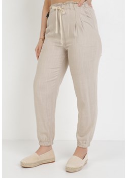 Beżowe Spodnie Therathis ze sklepu Born2be Odzież w kategorii Spodnie damskie - zdjęcie 109843819