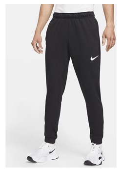 Męskie spodnie treningowe o zwężanym kroju Nike Dri-FIT - Czerń ze sklepu Nike poland w kategorii Spodnie męskie - zdjęcie 126290456