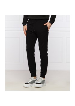 GUESS JEANS Spodnie dresowe ADAM | Regular Fit ze sklepu Gomez Fashion Store w kategorii Spodnie męskie - zdjęcie 128044185