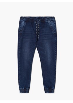 Cropp - Jeansy joggery męskie - surowy granatowy ze sklepu Cropp w kategorii Jeansy męskie - zdjęcie 129941256