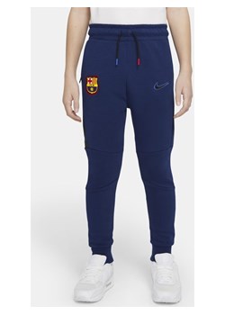 Spodnie dla dużych dzieci FC Barcelona Tech Fleece - Niebieski ze sklepu Nike poland w kategorii Spodnie chłopięce - zdjęcie 133270117
