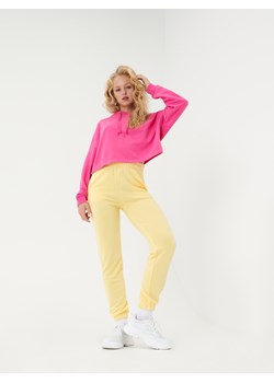 Sinsay - Spodnie dresowe basic - Żółty ze sklepu Sinsay w kategorii Spodnie damskie - zdjęcie 133408239